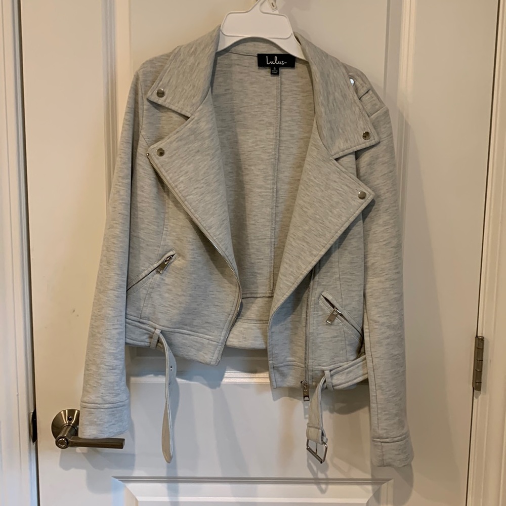 Small grey lulus jacket! Very flexible material and comfy!